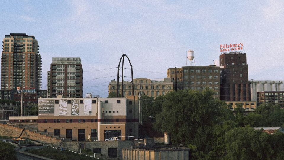 image of a city skyline with a grayblue sky